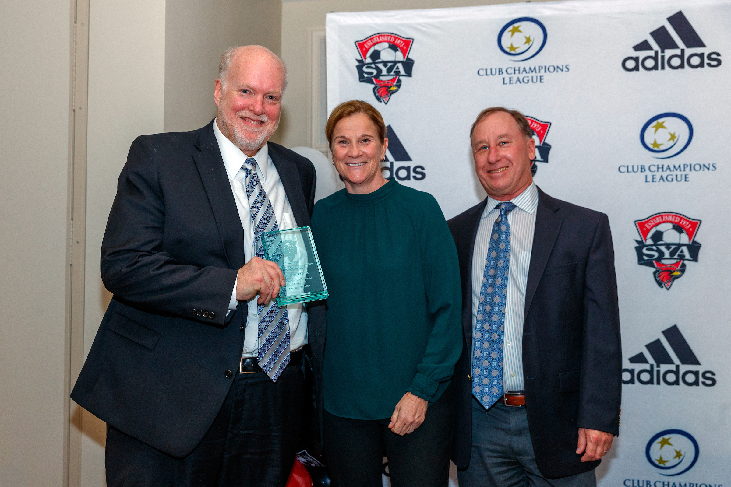 (L to R) Hall of Fame Inductee - Brian Hunt, 2 Time World Cup Champion - Jill Ellis, 2020 SYA President - Jeff Stein